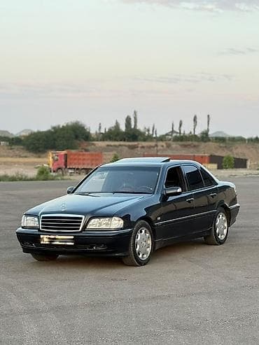 bmw m3 e92: Mercedes-Benz C-Class: 2.4 l | 1998 il Sedan — 3