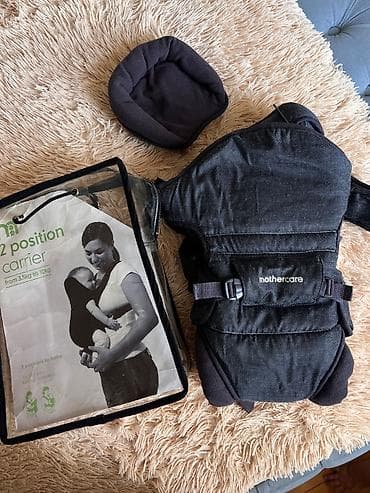 MotherCare brendine mexsus olan kenquru (usaq dasiyicisi).Istifade — 2