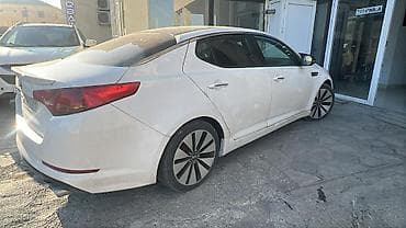 maşin satilir: 2012 Kia Optima servis tam full 15.600 AZN tecılı satılır 
0515437171 — 2