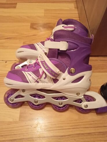 Digər idman və istirahət malları: Bənövşəyi-ağ rəngli inline (təkərli) rolliklər - Marka üzərində — 3