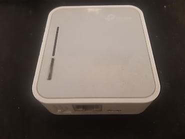 data kart limitsiz internet: TP-Link daşınan Wi‑Fi router (travel router) Xüsusiyyətlər: - Kompakt — 2