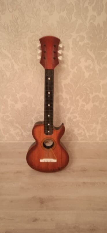 oyuncaq gitara: Oyuncaq qitara 18 AZN yenidir — 1
