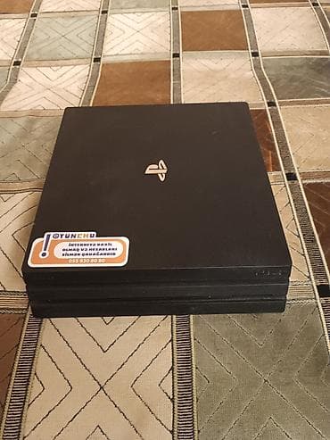 playstation 4: Sony PlayStation 4 Pro oyun konsolu və DualShock 4 simsiz idarəetmə — 4