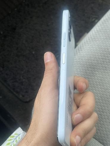 still cool android: Ağıllı telefon – ağ rəngdə, yan tərəfdən düz kənarlı gövdə. - Sağ — 1