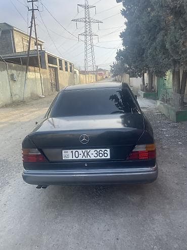 Mercedes-Benz E-Class: 2.6 л | 1990 г. Седан — 3