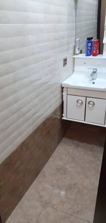 tam temirli menziller: İnşaatçılar metrosunun çıxısında inşaat binasında 12 mertebeli — 19