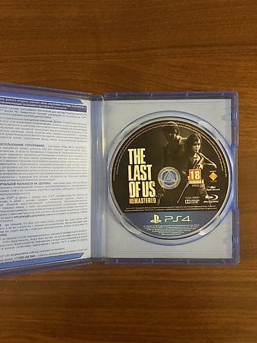 dvd disk: PS4 oyun diski: The Last of Us Remastered (Rus dilində versiya) - — 2