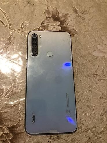 ikinci el kamera: Məhsul: Xiaomi Redmi smartfon Xüsusiyyətlər: - Arxa paneldə “Redmi” — 1