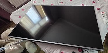 şhivaki tv: TAUBE LED TV – Model: 6538VIDAA Xüsusiyyətlər: - Ekran: Geniş, nazik — 1