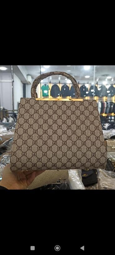 kurtka qadin ucun: Əl çantası — 10