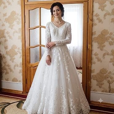 omaks gel: Gəlinlik – klassik A-line/prinsessa kəsimi, uzun ətəkli və quyruqlu — 1