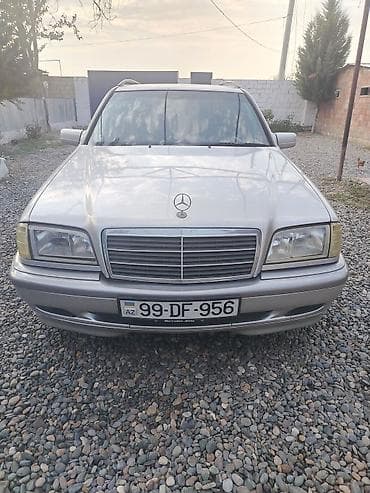 opel astra k: Mercedes-Benz C‑Class Universal (W202) – gümüş rəngli stansiyon vaqon — 4