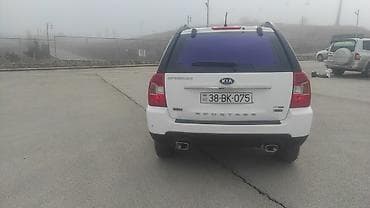 авто азербайджане: Kia Sportage (ağ rəng), kompakt krossover/SUV. Texniki və xarici — 6