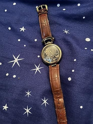 Mexaniki qol saatı – retro/cib-saat üslublu transformasiya olunan