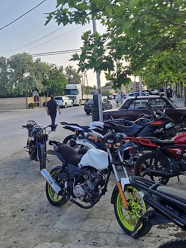 maşın ucun qoşqu: Modifikasiya olunmuş yol motosikleti - Güclü tək silindrli benzin — 2