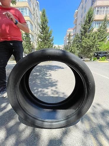 lada diskleri: İşlənmiş Şin Continental 275 / 35 / R 22 — 1