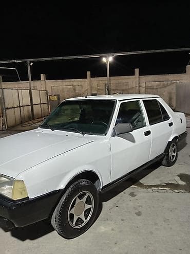 man sat: Model: Tofas (sedan) Kuzov: 4 qapılı, ağ rəng Sükan: solda Yanacaq — 6