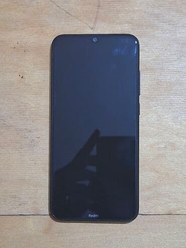 xiaomi not 8 ekran: Xiaomi Redmi smartfon - Arxa panel: parlaq qara rəng, mərkəzdə barmaq — 2