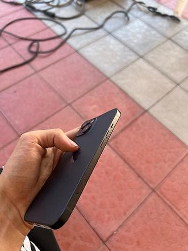 note 15: IPhone 15, 128 GB, Qara — 6