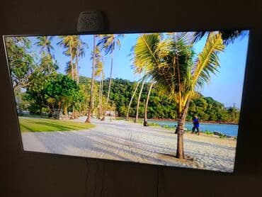 plazma smart tv: Panasonic Smart TV – iri diaqonallı, nazik çərçivəli divara montaj — 7