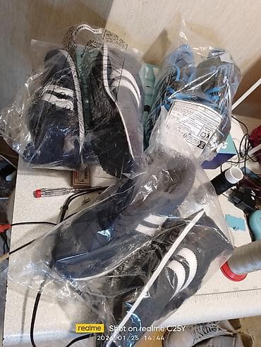 Asia: Məhsul: Kişi/kadın idman ayaqqabısı (bağlı, rezin altlıq) 41.42 — 3