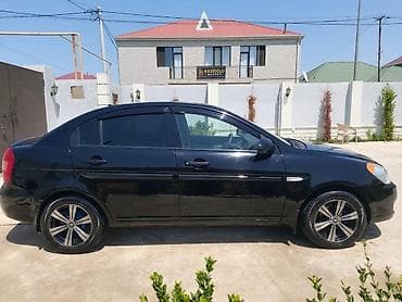 multi sukan: Hyundai Accent: 1.4 l | 2008 il Sedan — 6