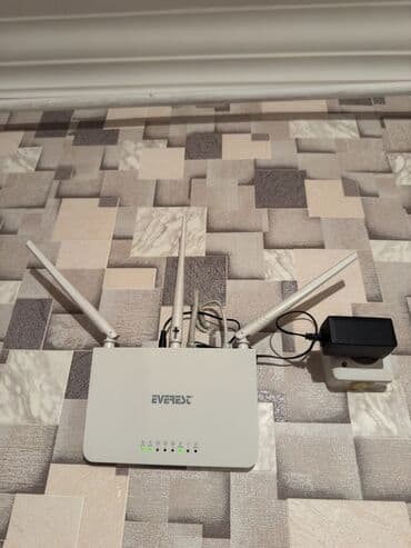Техника для кухни: Everest Wi‑Fi router - Brend/model: Everest (üzərində “EVEREST” — 1