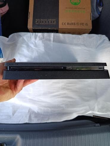 ps4 plus: Məhsul: Sony PlayStation 4 Slim konsolu + 2 ədəd DualShock 4 simsiz — 4