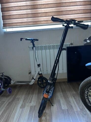 mercedes yan guzguler: Şəhər içi rahat gediş üçün iki ədəd böyük təkərli skuter — 2