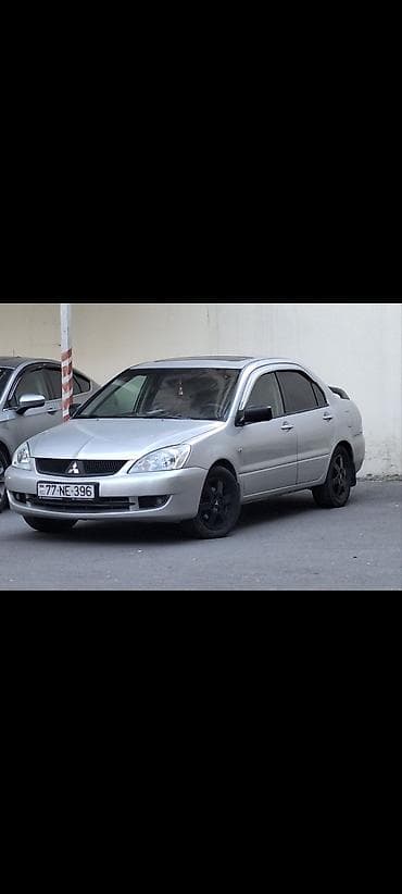 cəliloğlu avto: Mitsubishi Lancer sedan – gümüşü rəng, qara disklər. Nömrə: 77-NE-396 — 9