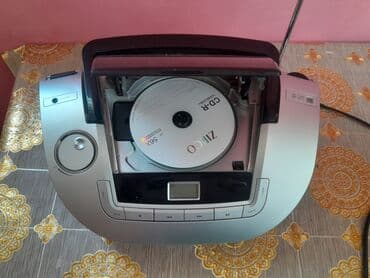 ariston ikinci əl: Portativ CD pleyer və radio. Gümüşü və qara rəngdə olan bu cihaz, CD-R — 1