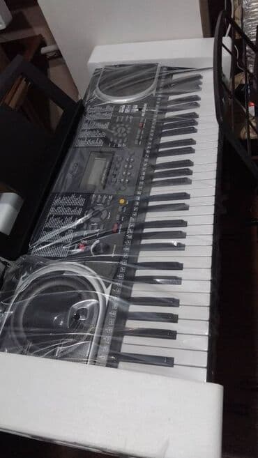 кара погрузчик: Yeni başlayanlar üçün piano və ya sintezator kursu üçün Həvəskarlar — 4