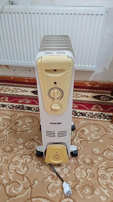 yağ radiyatoru: Nikai radiator-elektrikli isidici - Rəng: ağ-krem - Səssiz iş rejimi — 2