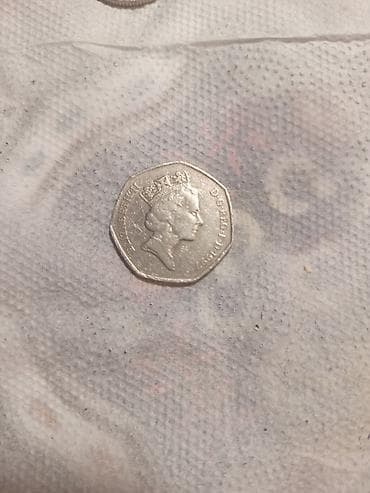 Məhsul: Böyük Britaniya 50 pence sikkəsi (heptaqonal) Təsvir: -