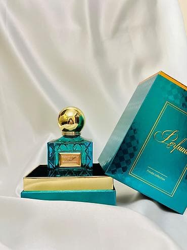 Lüks uniseks ətir – mavi-yaşıl şüşədə, qızılı detallar və metalik