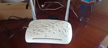 tp link qiymetleri: TP-Link Wi‑Fi router - Model: TP-Link (üstdə dekorativ deşikli ağ — 1