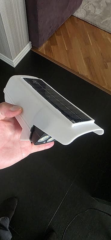 şəkill: Məhsul: Günəş enerjili hərəkət sensorlu LED proyektor/saxta kamera — 4