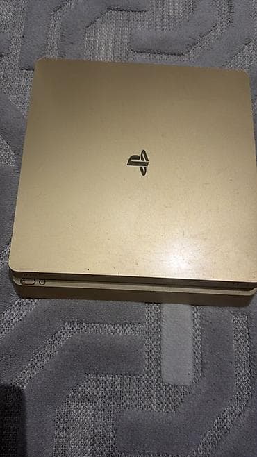 Qızılı rəngdə Sony PlayStation 4 Slim oyun konsolu - Rəng: qızılı