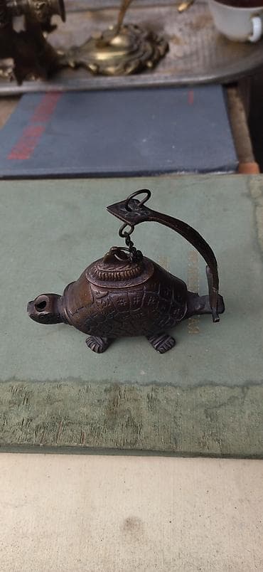 qedimi pullarin alinmasi: Məhsul: Bəzəkli tısbağa formalı yağ çırağı (bürünc) Təsvir: - — 1