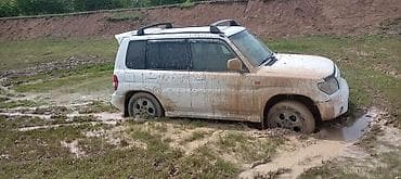 Nəqliyyat: Mitsubishi Pajero: 1.8 l | 1999 il 30000 km Sedan — 1