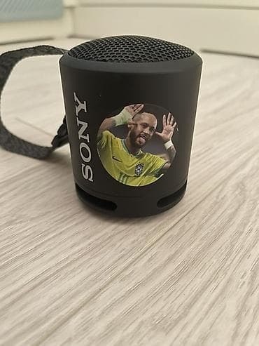 2106 dinama: Kompakt portativ Bluetooth kalonkası – Sony brendli, silindrik dizayn — 1