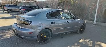 teker 215 65 16: Mazda 323: 2.3 l | 2004 il Sedan — 2