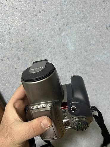 motorlar: Olympus IS-100 (Centurion seriyası) 35mm filmli SLR “bridge” — 1