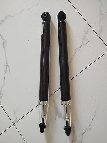 ford hisseleri: Məhsul: Avtomobil üçün arxa amortizatorlar (2 ədəd cüt) Təsvir: - — 1