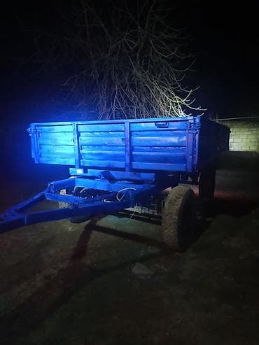 traktor 82 satisi az: Traktor qoşqusu – 2 oxlu, yanları açılan metal bortlu yük platforması — 1