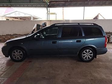 07 diskləri: Opel Astra: 1.6 l | 1998 il Universal — 6