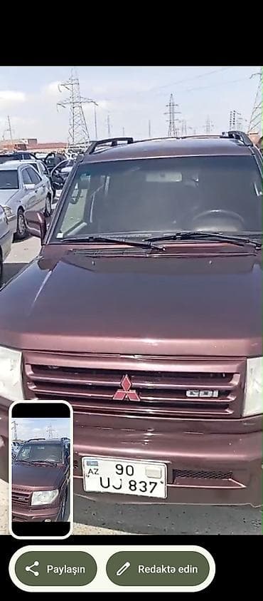 mitsubishi lancer: Mitsubishi Pajero iO/GDI, tünd bənövşəyi (şokolad) rəng. - Kuzov: 5 — 5