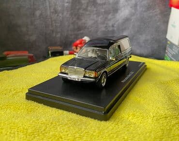 metbex tavan modelleri: Коллекционная модель Mercedes-Benz 200 W123 Hearse black 1982 Schuco — 11