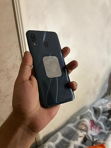 samsung a91: Samsung Galaxy A30, 64 GB, rəng - Boz, İki sim kartlı — 6