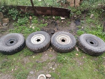 tekərlər: Məhsul: 4 ədəd avtomobil şini disklərlə birlikdə. Xüsusiyyətlər: - — 3